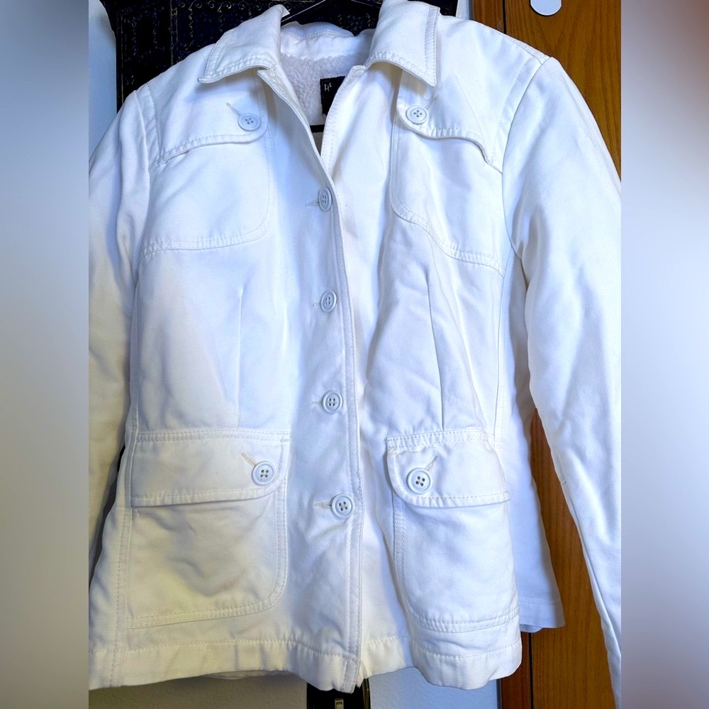 Super cute white jacket.